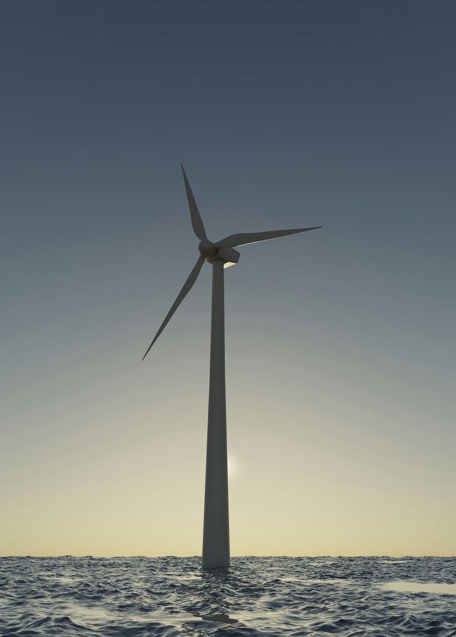 Offshore wind turbine at dawn
